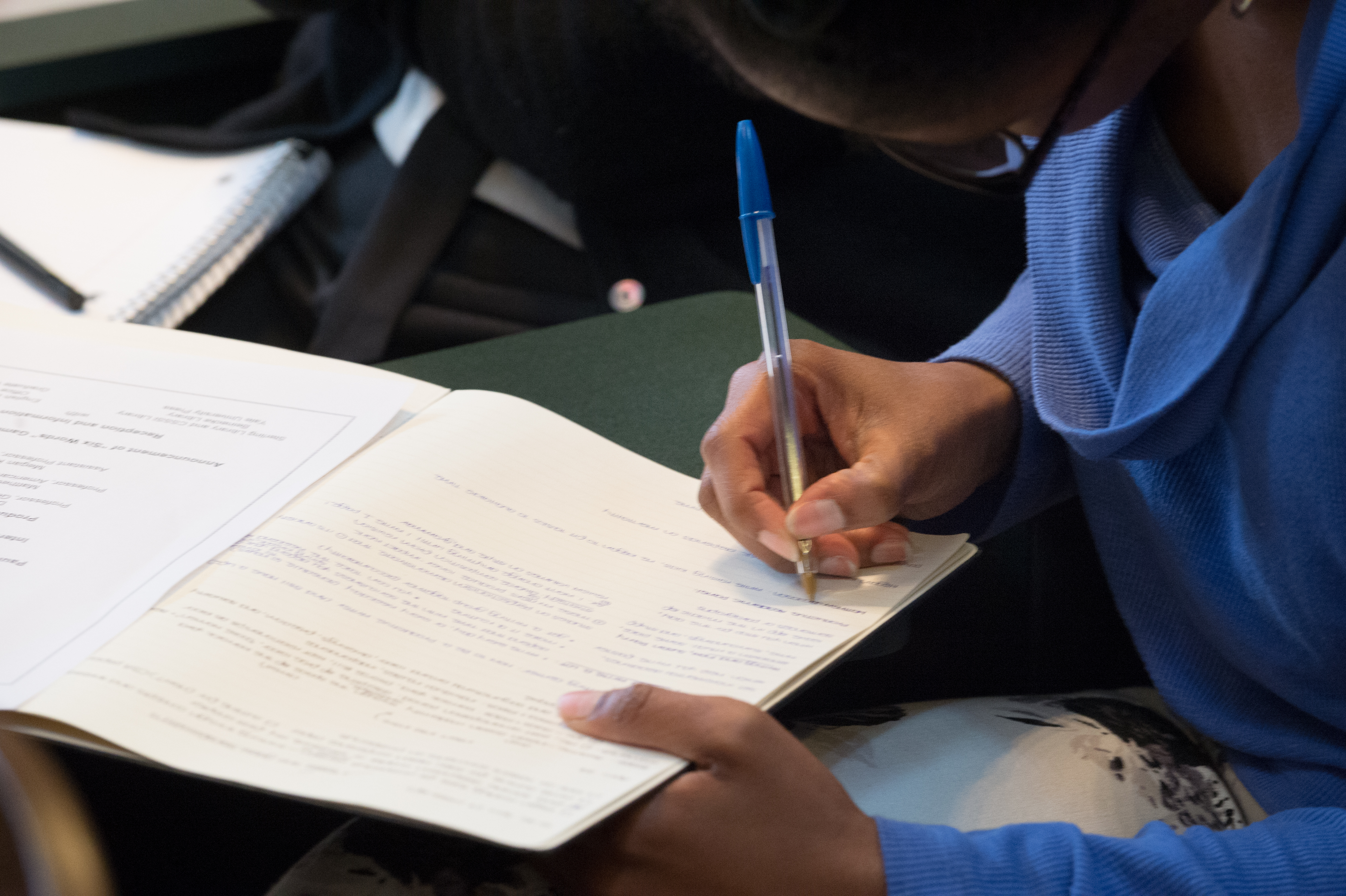 student filling out a test booklet