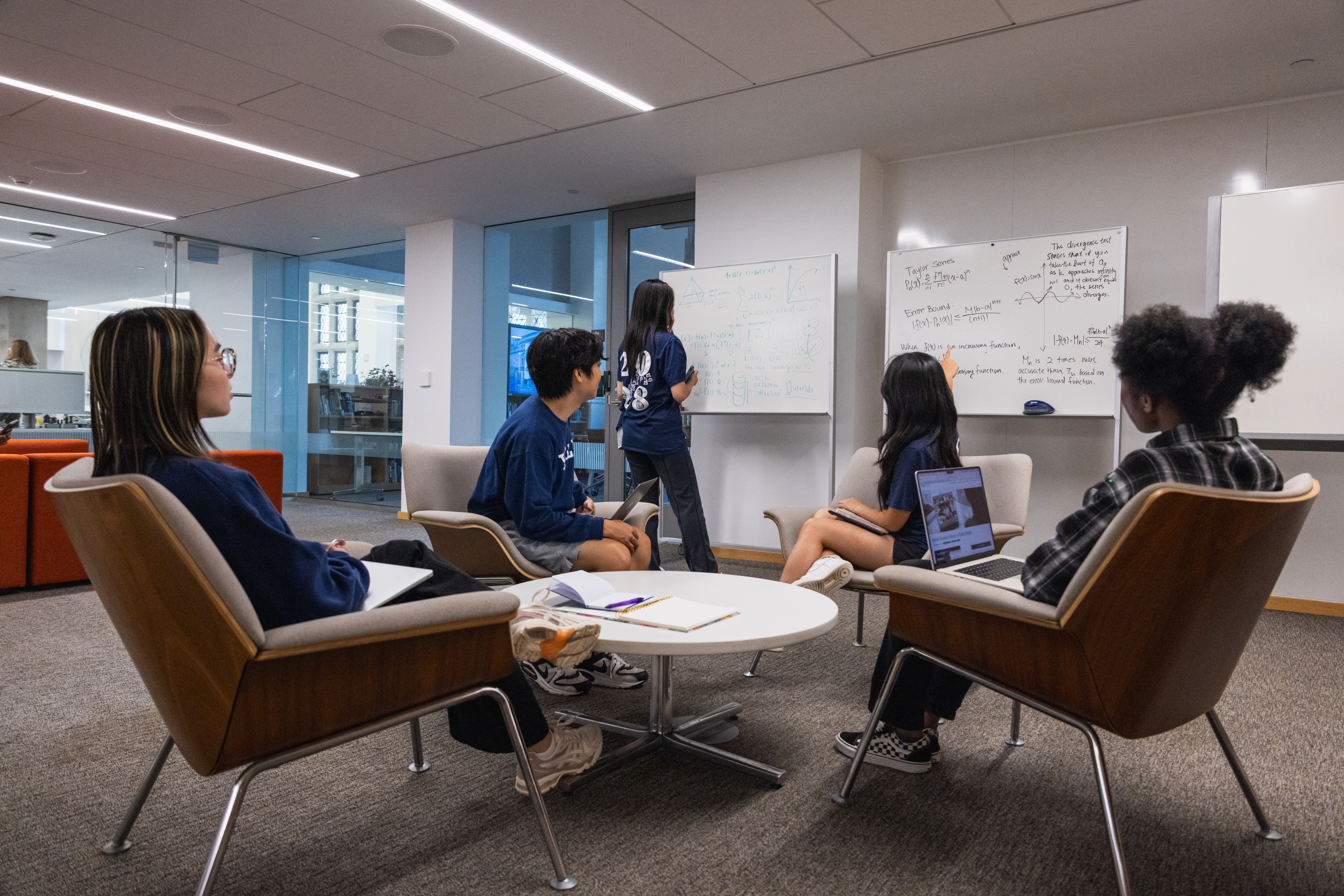Group of students learning from each other