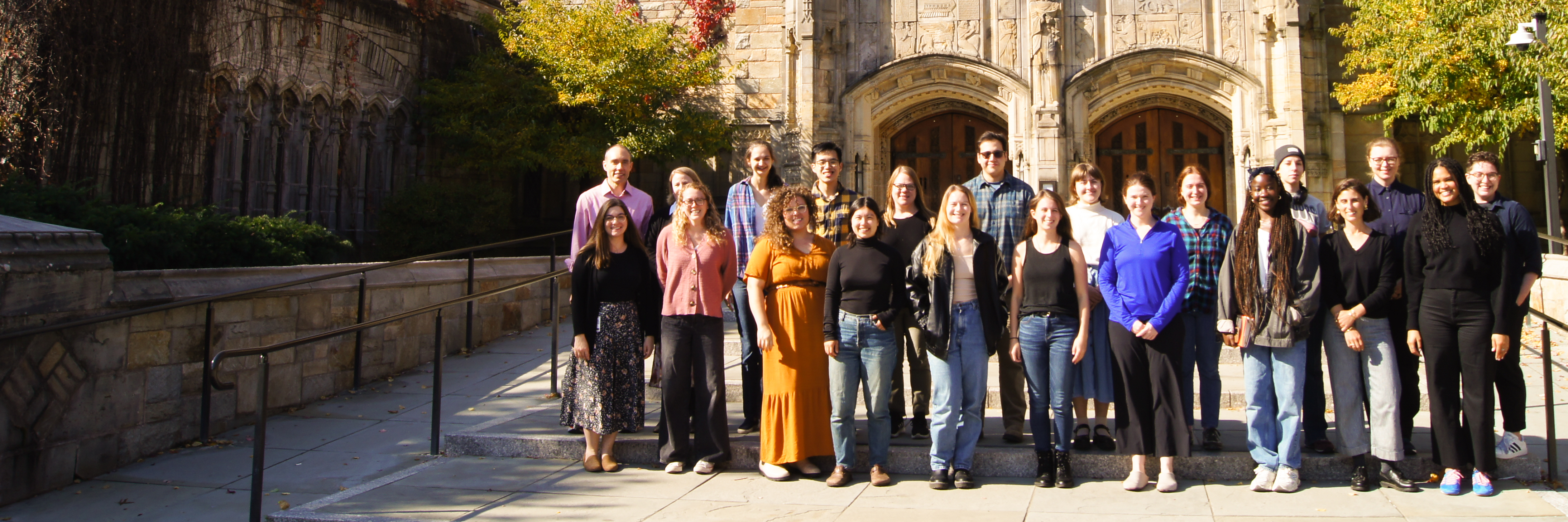 The 2024 Graduate Writing Lab Fellows on the steps outside Sterling Memorial Library