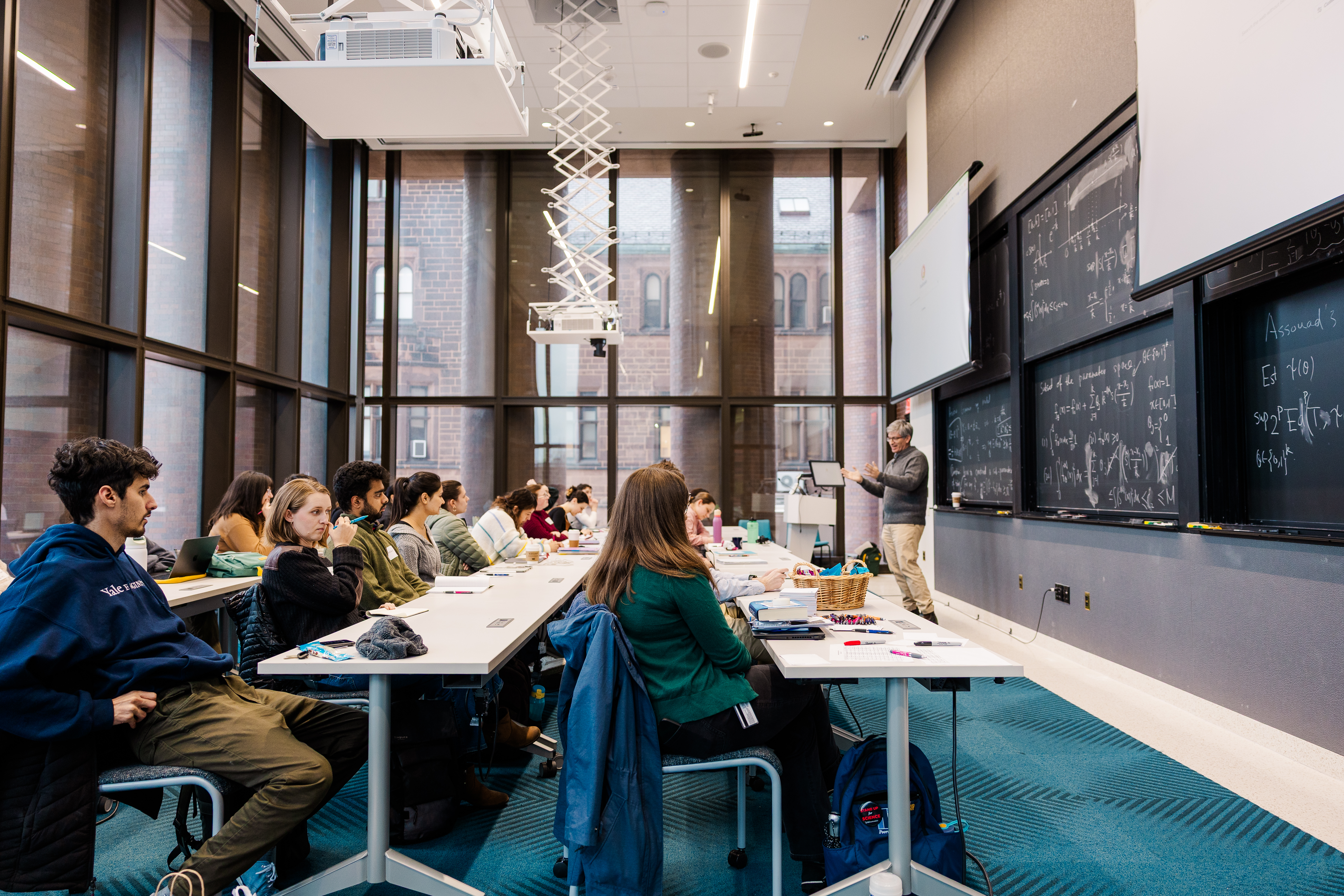 instructor teaches in front of class