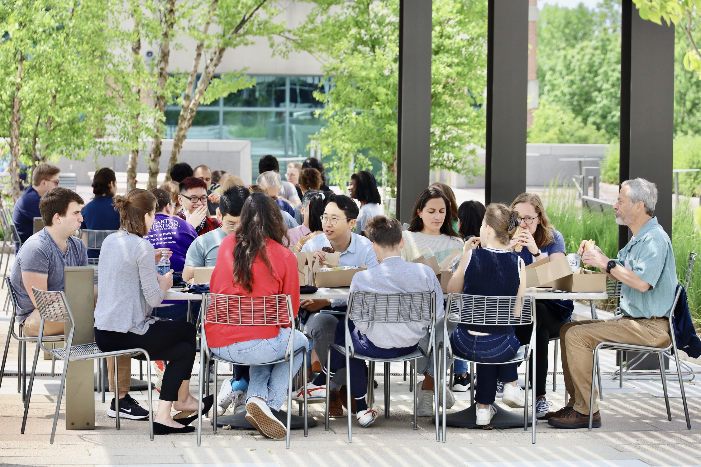 Staff eating together outside