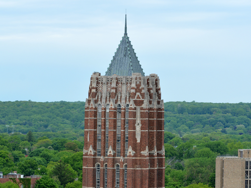 Yal'e Poorvu Center works with the GSAS for the Associates in Teaching Program. An image of the GSAS tower with West Rock.