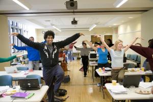 Students stretching at writing bootcamp.