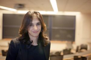 Dr. Rohini Pande headshot in classroom at Harvard University