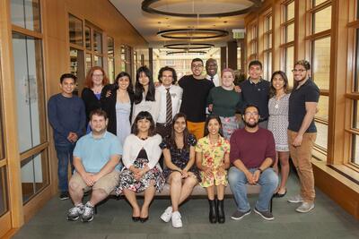 A group of FGLI students and Dr. Karin Gosselink smiling at the camera. 