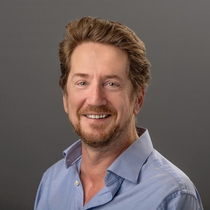 Headshot of Alfie Guy, Deputy Director; Director of Undergraduate Writing and Tutoring
