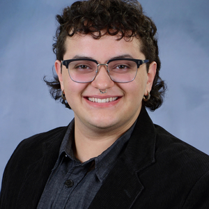 headshot of adrian