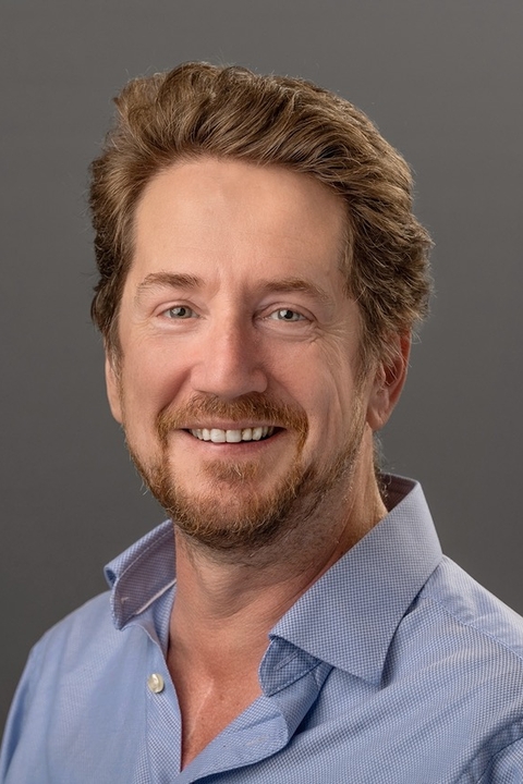 Headshot of Alfie Guy, Deputy Director; Director of Undergraduate Writing and Tutoring