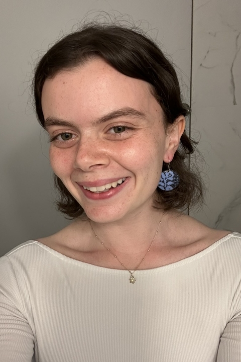 headshot of Talia