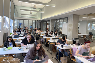 Students Writing at a Graduate Writing Lab All Write event.