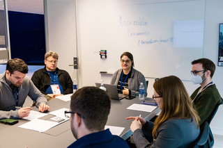 Poorvu staff meet during accessibility workshop