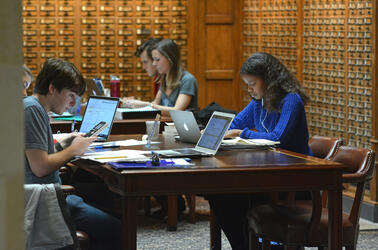 Students Studying in Sterling Memorial Library