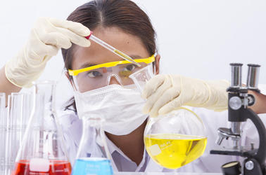 A student works in a lab on an experiment