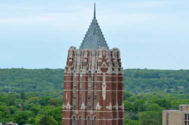 Yal'e CTL works with the GSAS for the Associates in Teaching Program. An image of the GSAS tower with West Rock.