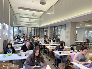 Students Writing at a Graduate Writing Lab All Write event.