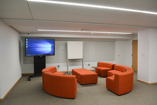 Circular couches on the Poorvu Center mezzanine.