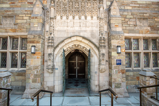 The entrance to the Poorvu Center from outside Sterling Memorial Library.