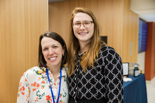 Two Poorvu Center staff members pose at the opening of Poorvu North.