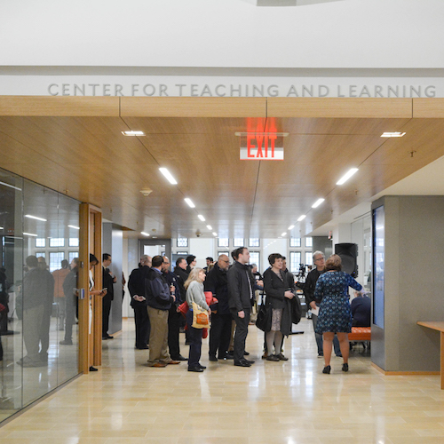 a group of people stean in the CTL hallway